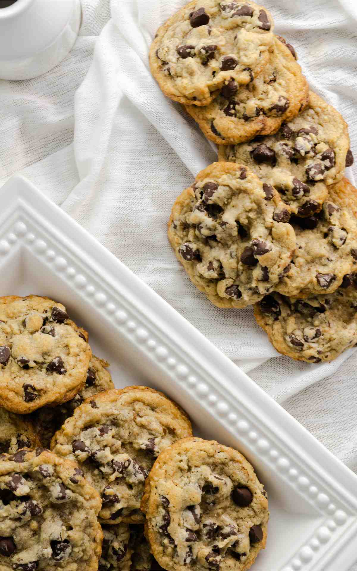 Birds eye view of chocolate chip DoubleTree Cookies on white background.