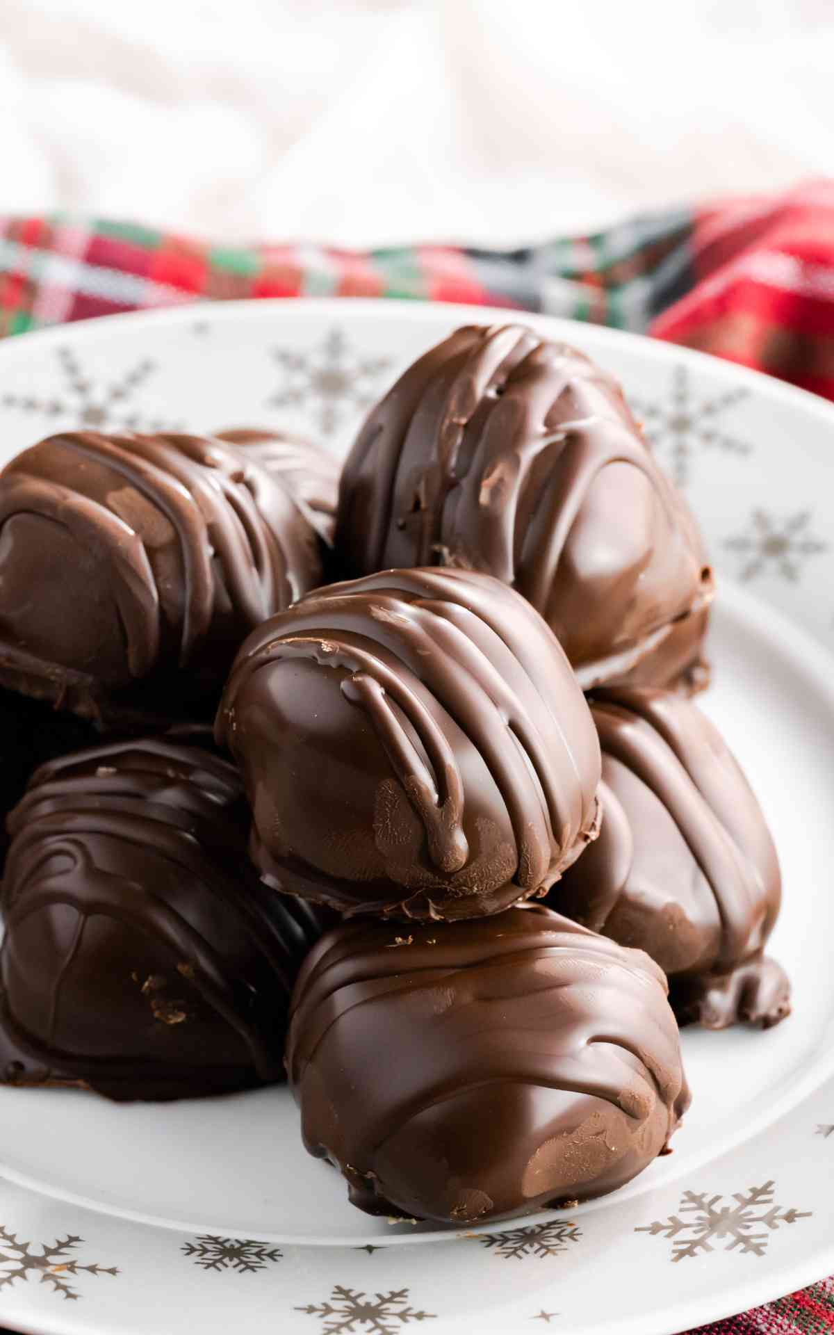 Close up of a pile of gluten free peanut butter balls.