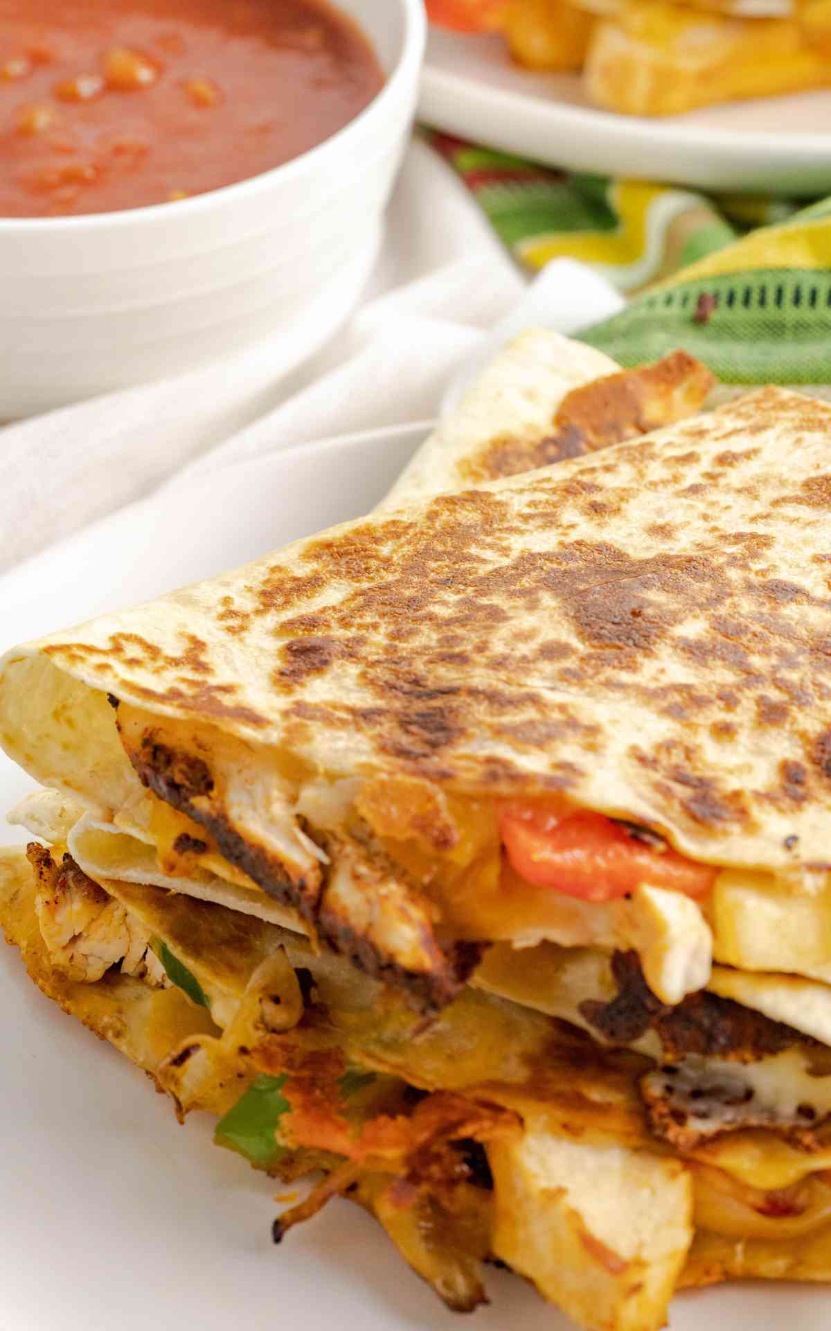 Golden brown quesadillas made with fajita style chicken and crisp veggies.