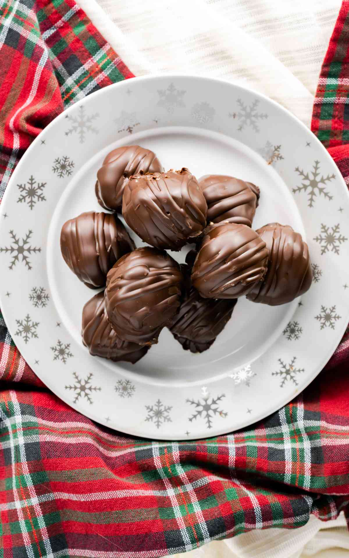 Peanut Butter Balls on a snowflake plate.