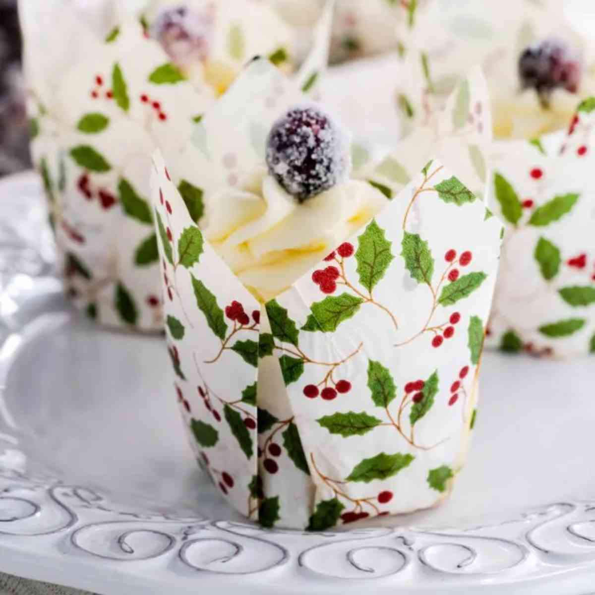 White Chocolate Cupcakes with frosted cranberries