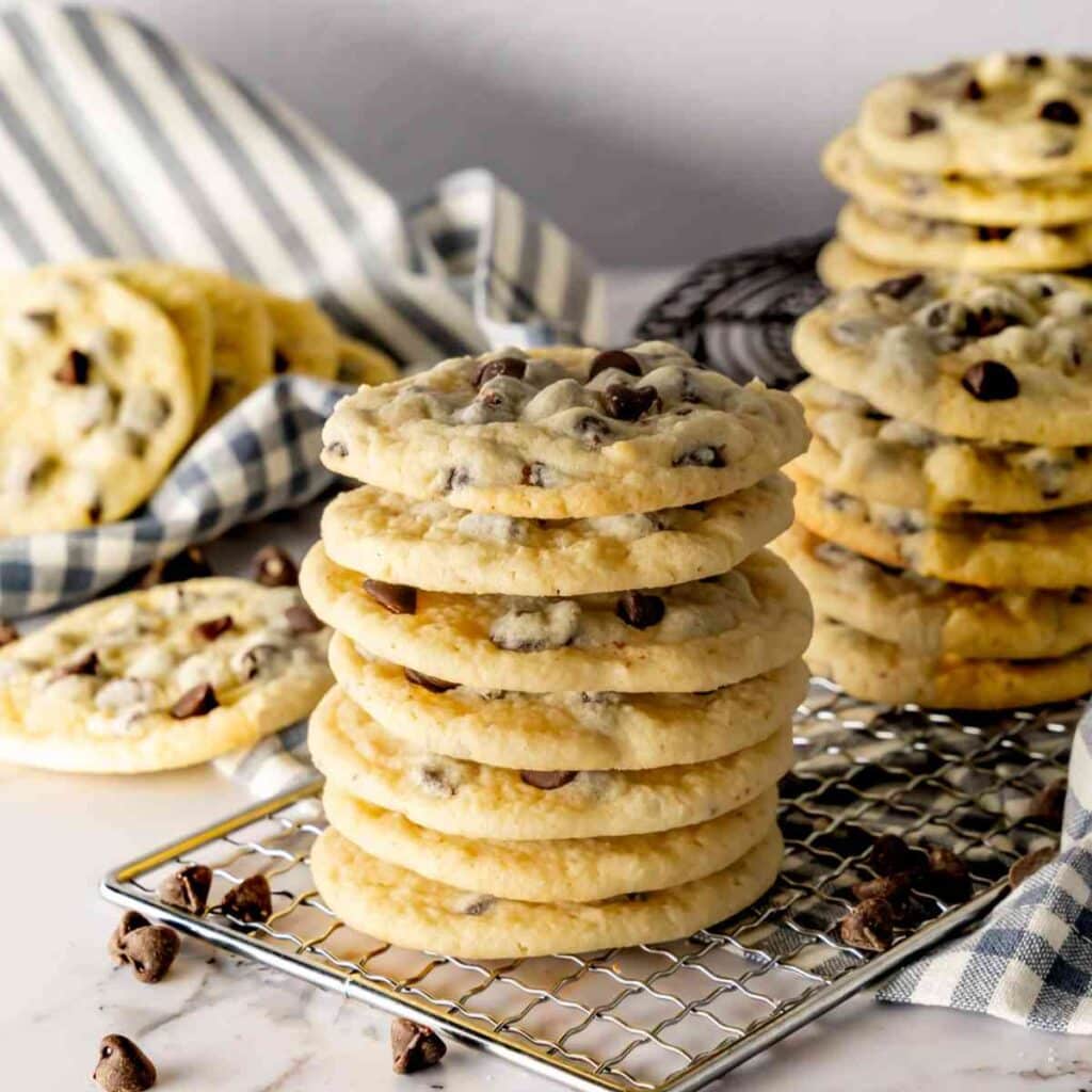Chocolate Chip Cookies without Brown Sugar stacked on a wire rack.