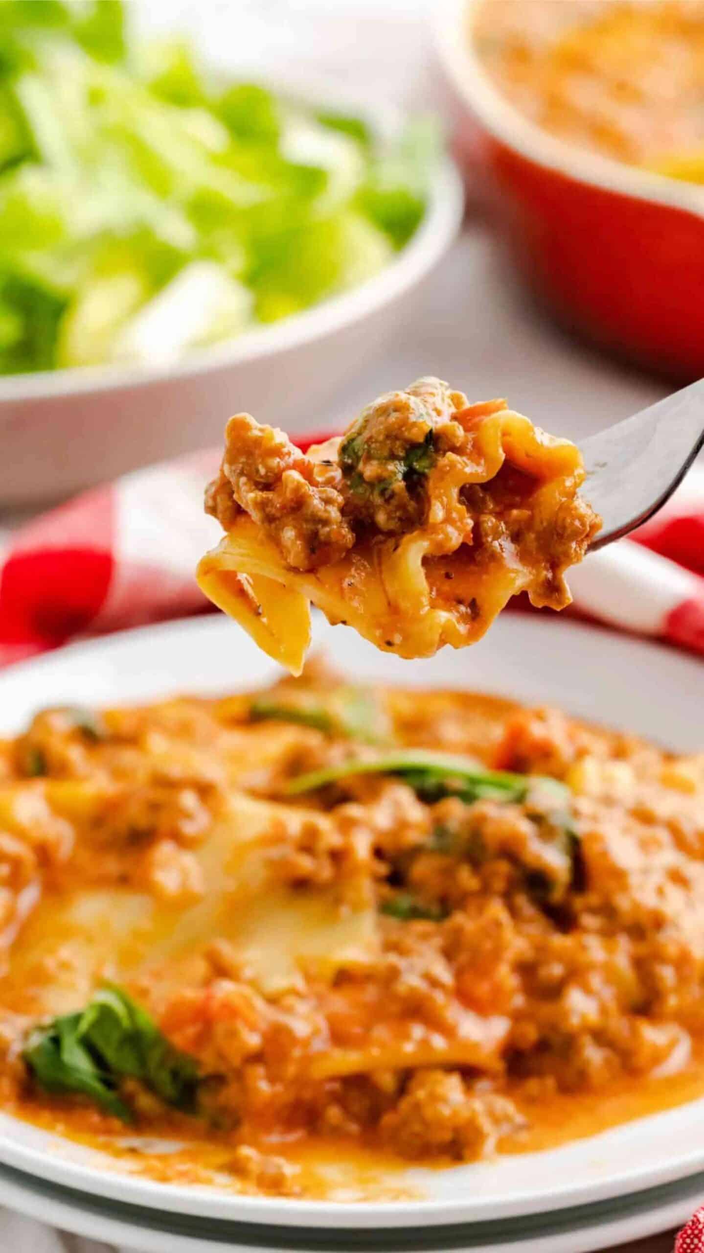 A serving dish of Instant Pot Lazy Lasagna with a bowl full.