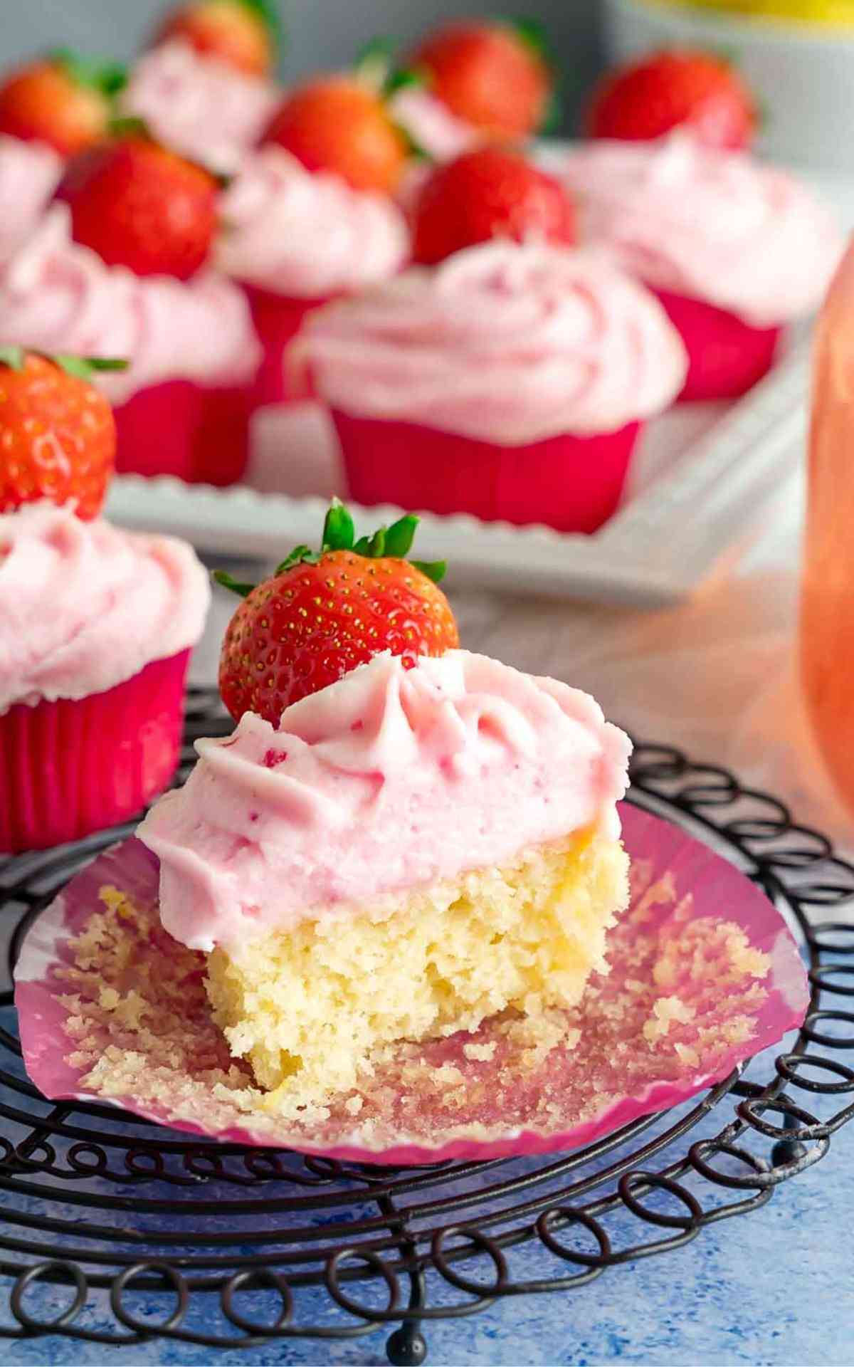 A lemonade strawberry cupcake cut in half.