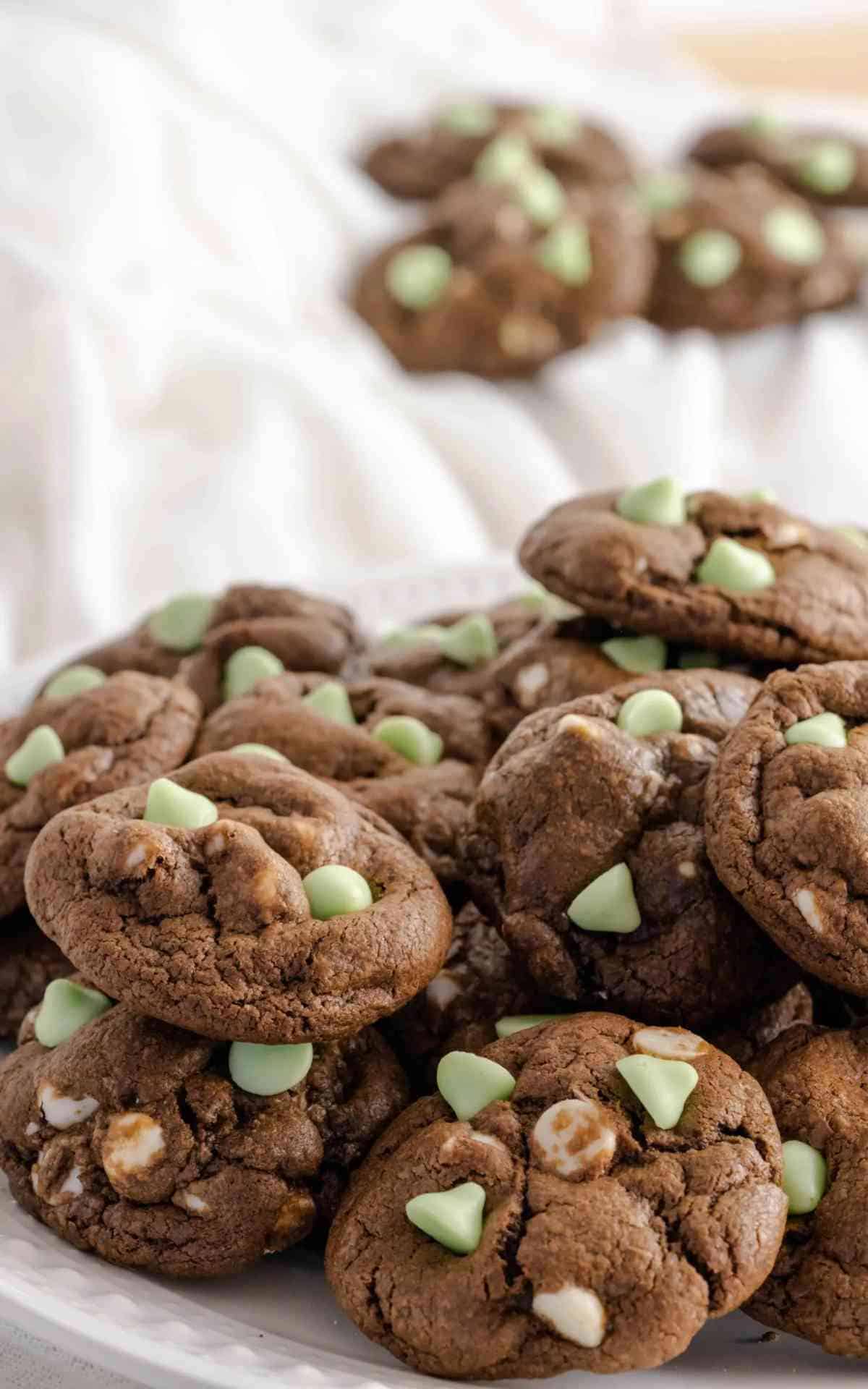 Close up of mint chocolate cookies with white chocolate chips.