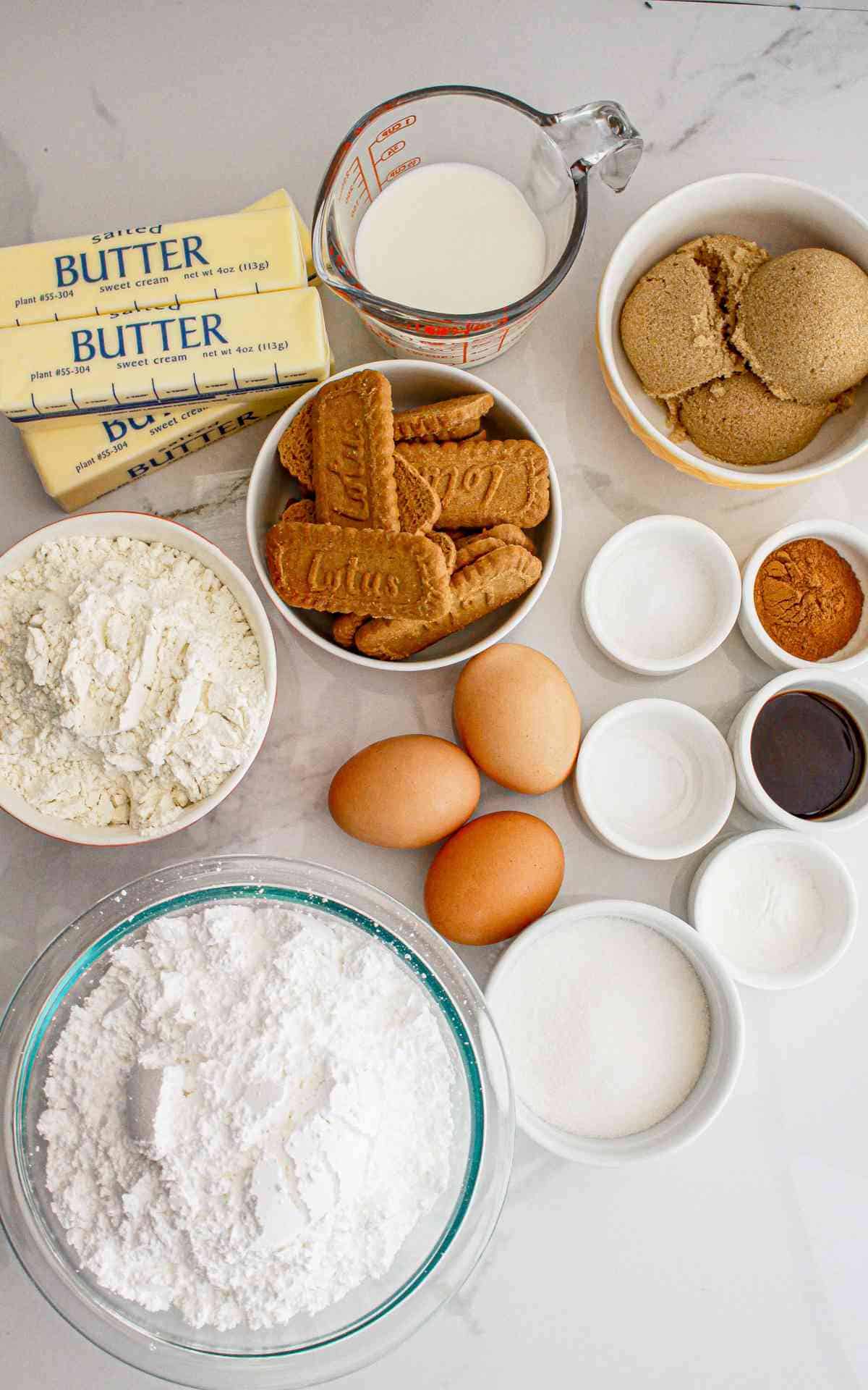 Biscoff cupcakes ingredients in bowls.