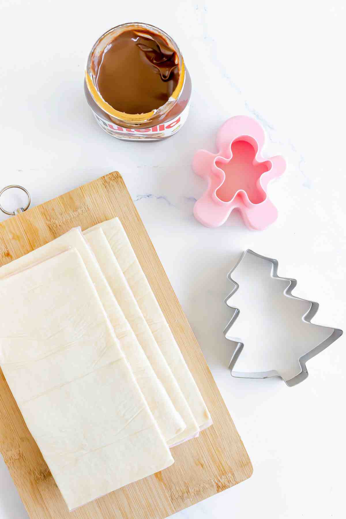 Nutella with puff pastry process photo.