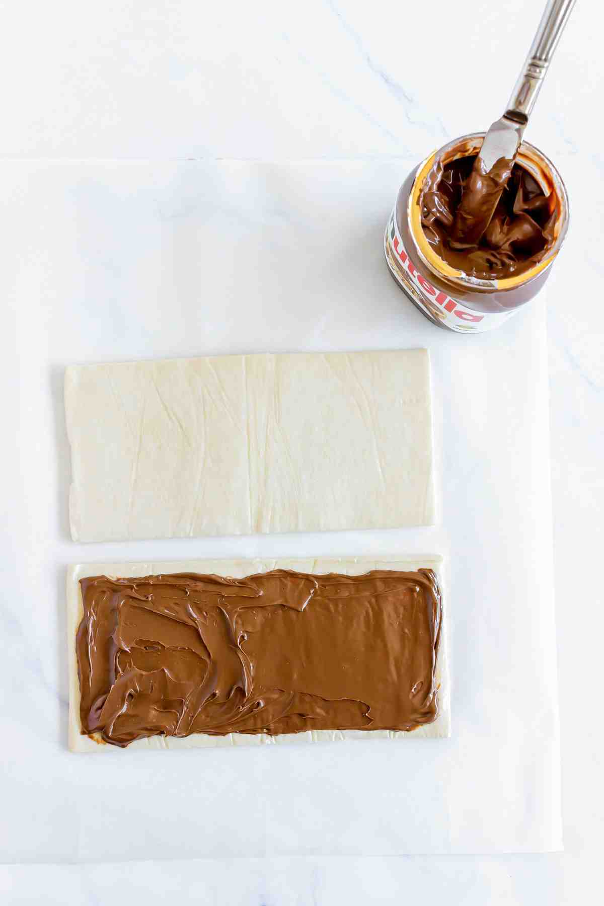 Puff pastry process picture with Nutella.