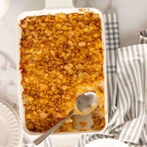 Funeral potatoes recipe with cheesy hashbrowns and cornflake topping