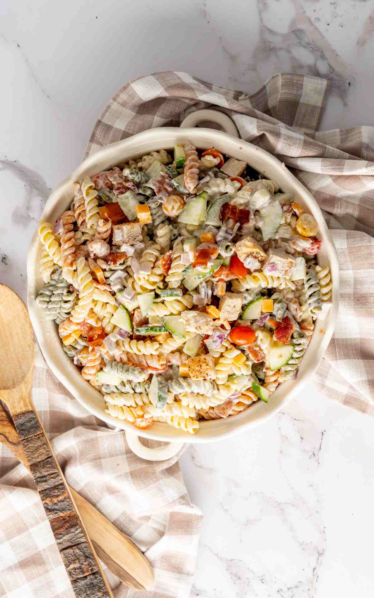 Chicken bacon ranch pasta salad recipe combined in a large bowl.